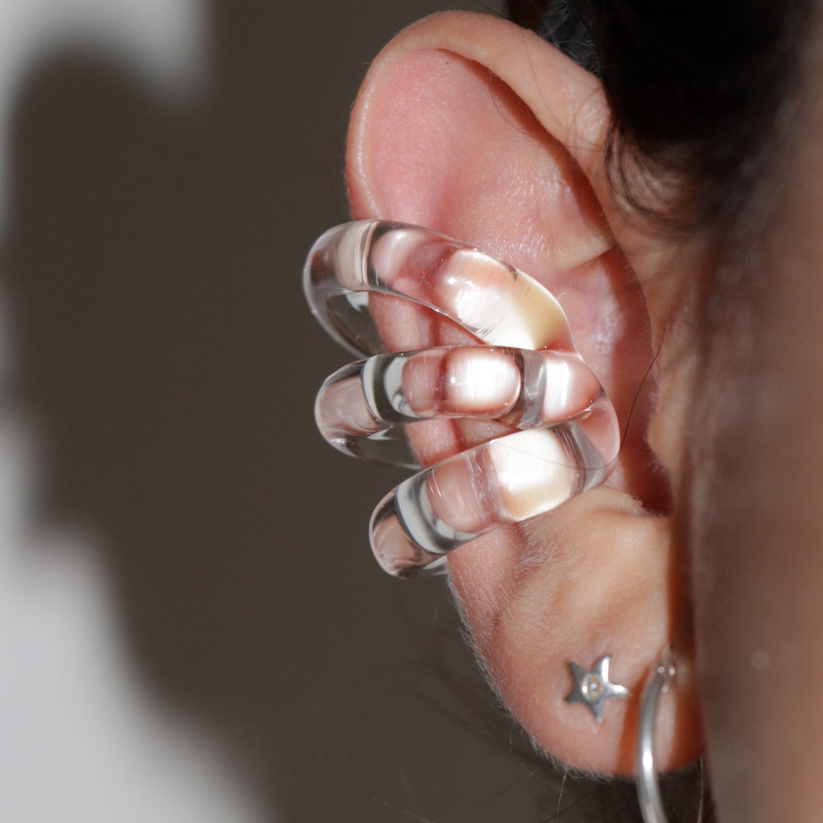 Chic triple layer ear cuff, no piercing needed. Trendy gold tone, side view (2 of 3).